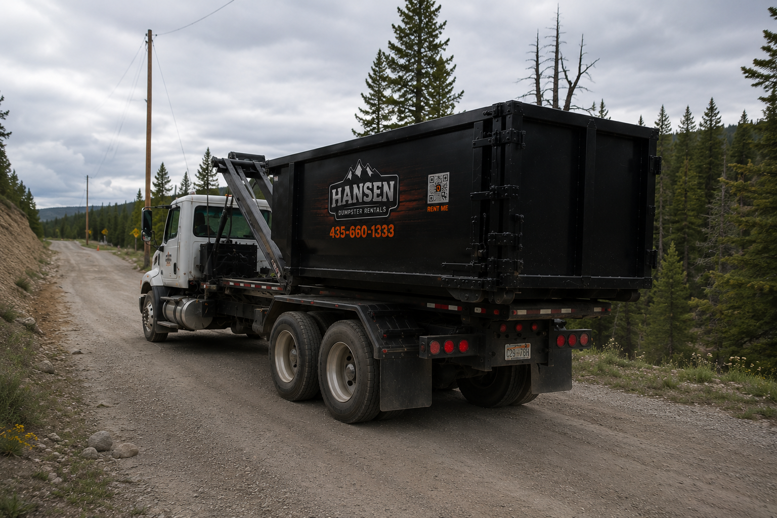 Hansen Dumpster Rentals branded roll-off truck and dumpster serving Utah County, Tooele County, and Juab County